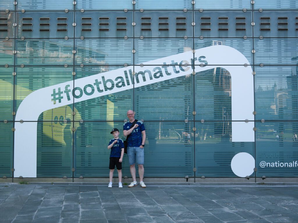 Ellis and his Dad outside the National Football Museum in Manchester